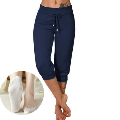 👖 Feszítőzsinóros derékrészű, rövidített melegítőnadrág – tökéletes otthoni kényelemhez