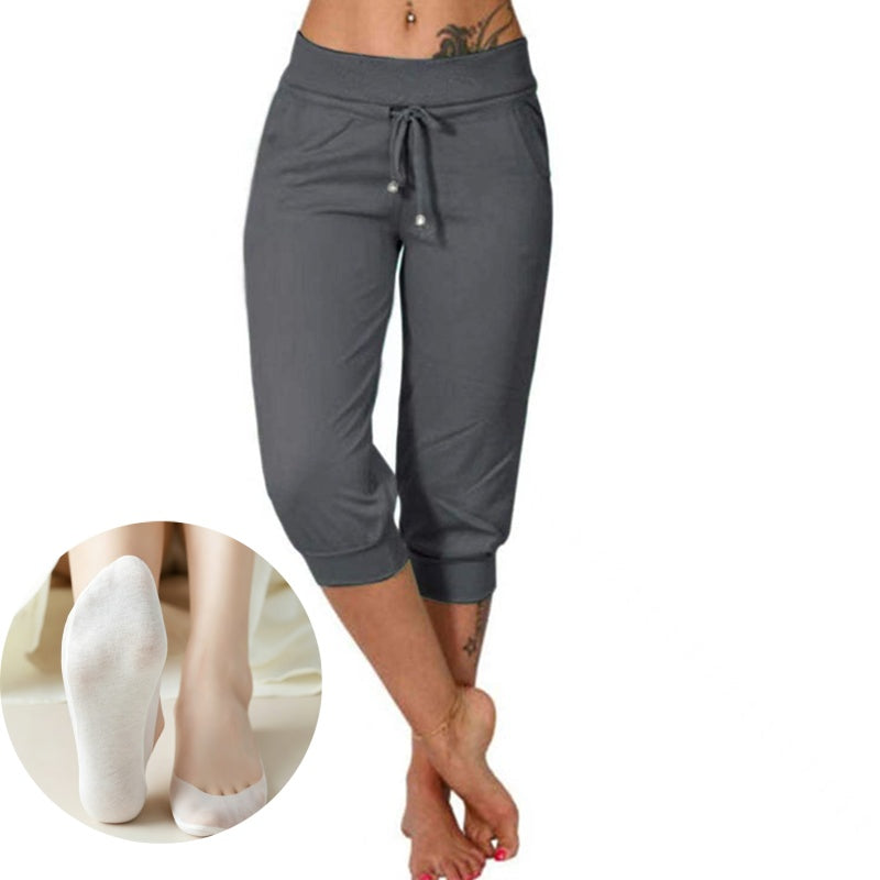 👖 Feszítőzsinóros derékrészű, rövidített melegítőnadrág – tökéletes otthoni kényelemhez