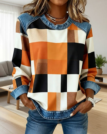 Kockás, patchwork mintás, kontrasztos színű pulóver