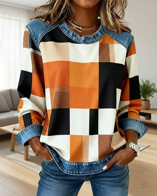 Kockás, patchwork mintás, kontrasztos színű pulóver