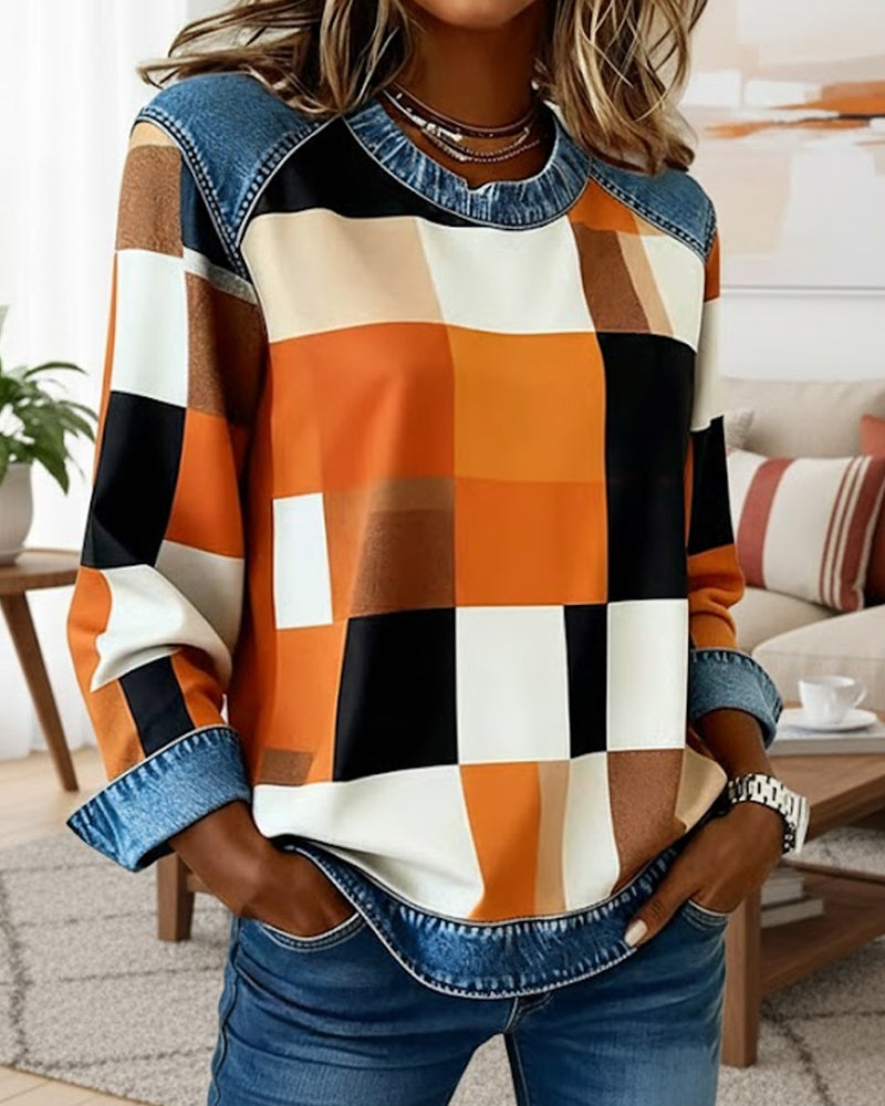 Kockás, patchwork mintás, kontrasztos színű pulóver