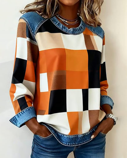 Kockás, patchwork mintás, kontrasztos színű pulóver
