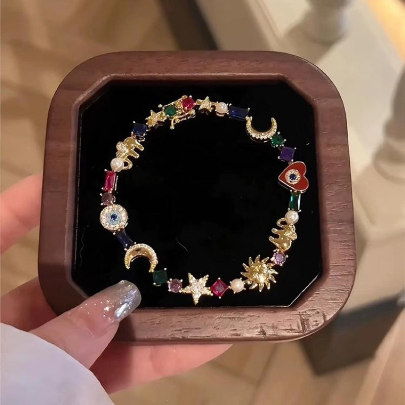🌙 Csillagos égbolt témájú karkötő – színes kristályokkal, titokzatos dizájnnal – Raktáron, utánvéttel 🔮✨
